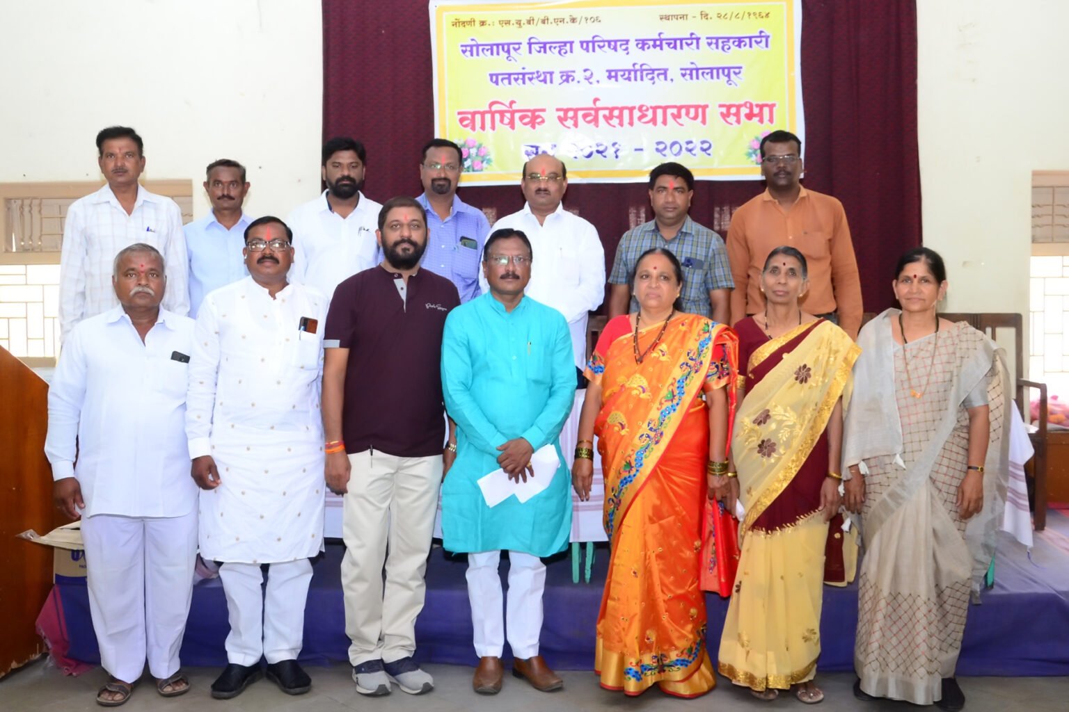 Zilla Parishad officials attending a gathering.